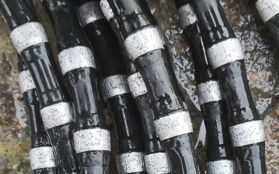 11.5mm Sable à fil diamanté à ressort en caoutchouc pour la carrière de l'exploitation minière Coupe de marbre de perles de diamant